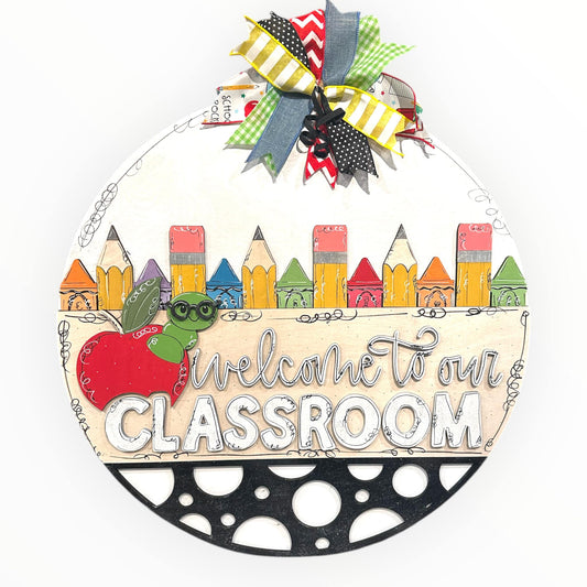 Welcome to our Classroom pencils and worm with glasses